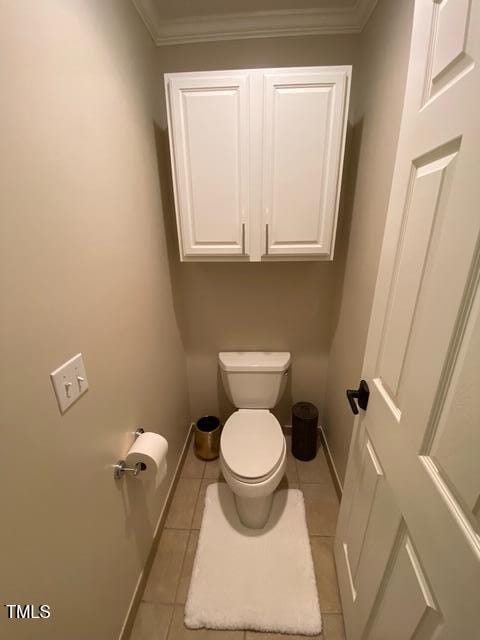 627 New Rd, Raleigh, NC 27608 - bathroom with tile patterned flooring and crown molding
