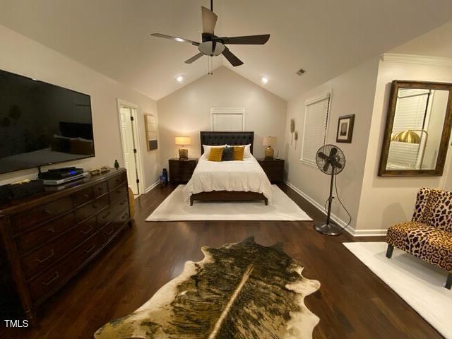 627 New Rd, Raleigh, NC 27608 - bedroom featuring wood finished floors, lofted ceiling, a ceiling fan, and recessed lighting
