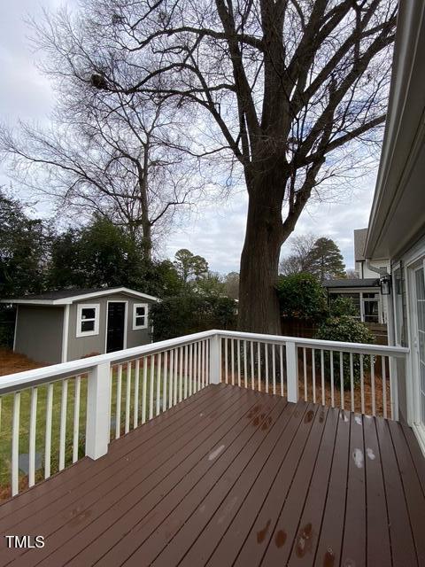 627 New Rd, Raleigh, NC 27608 - deck with an outbuilding