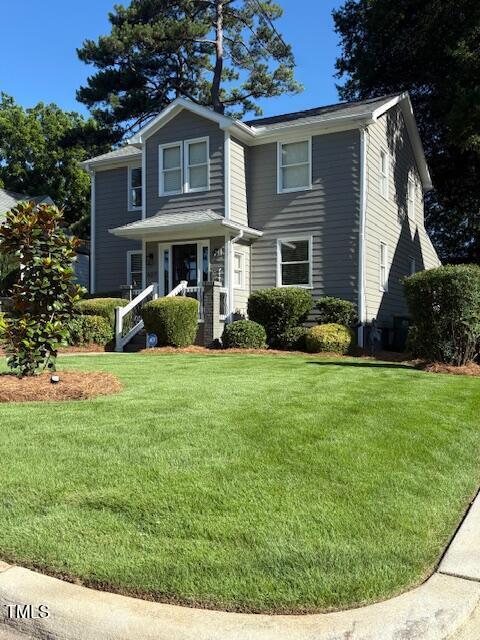 627 New Rd, Raleigh, NC 27608 - view of front of home with a front yard