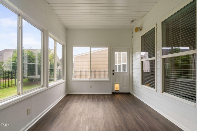1104 Gaston Manor Dr, Durham, NC 27703 - unfurnished sunroom with wood finished floors and baseboards