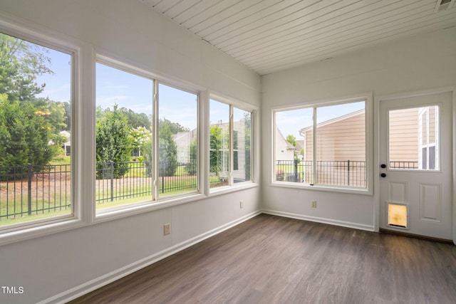 1104 Gaston Manor Dr, Durham, NC 27703 - unfurnished sunroom with wood finished floors and baseboards