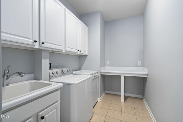 1104 Gaston Manor Dr, Durham, NC 27703 - washroom with cabinet space, separate washer and dryer, and light tile patterned flooring