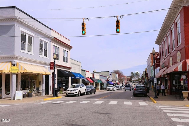 319 Great Northern Sta, Apex, NC 27502 - view of asphalt street with sidewalks, traffic lights, curbs, and street lights