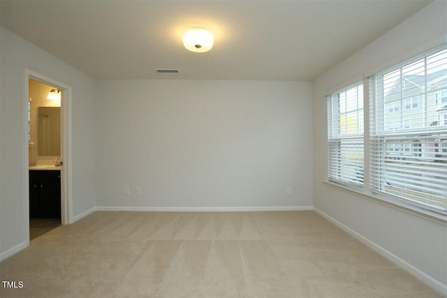 319 Great Northern Sta, Apex, NC 27502 - unfurnished bedroom featuring light colored carpet and ensuite bathroom