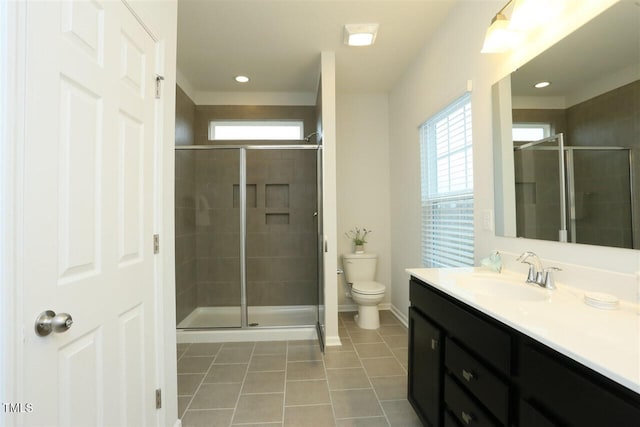 319 Great Northern Sta, Apex, NC 27502 - bathroom featuring tile patterned floors, vanity, and a stall shower