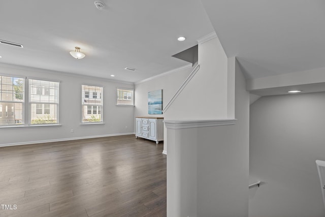 319 Great Northern Sta, Apex, NC 27502 - unfurnished living room featuring ornamental molding, dark wood-style flooring, and recessed lighting