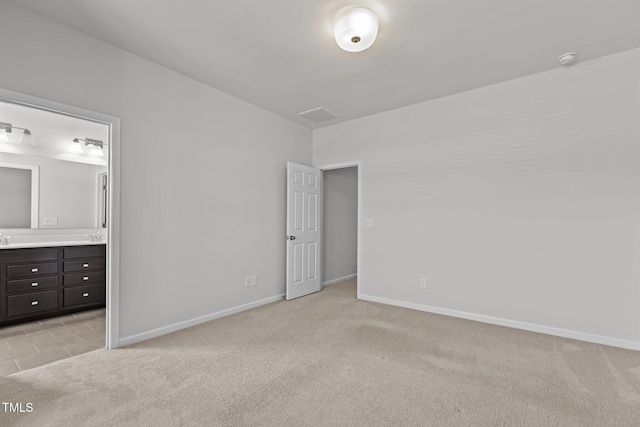 319 Great Northern Sta, Apex, NC 27502 - unfurnished bedroom with light colored carpet and ensuite bathroom