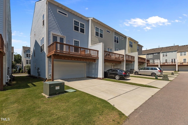 319 Great Northern Sta, Apex, NC 27502 - rear view of house with a lawn, driveway, a garage, and a residential view
