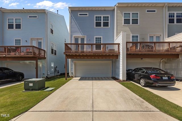 319 Great Northern Sta, Apex, NC 27502 - back of house featuring an attached garage, concrete driveway, and a yard