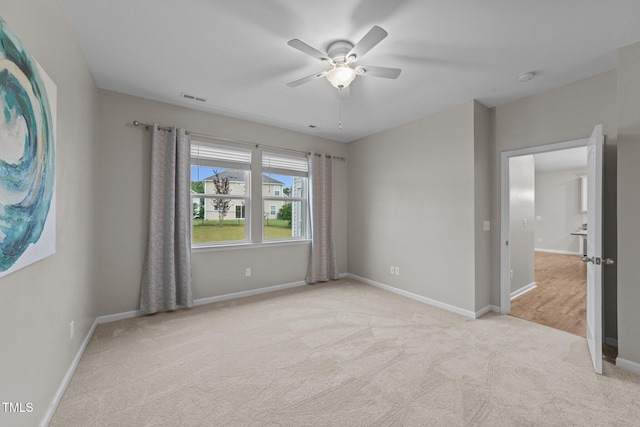 119 Yadkin St, Clayton, NC 27520 - empty room with light colored carpet, a ceiling fan, and a smoke detector