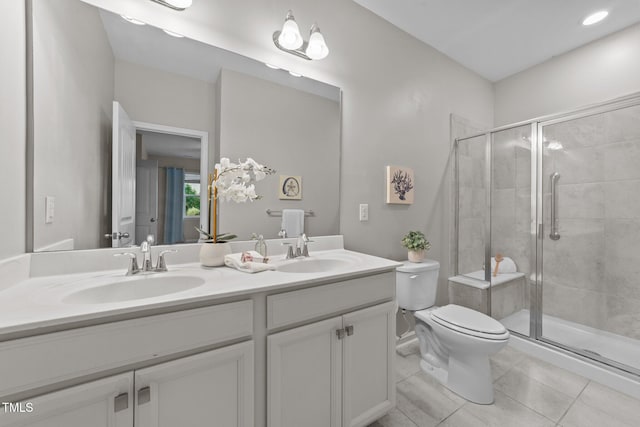 119 Yadkin St, Clayton, NC 27520 - full bath with double vanity, a stall shower, and tile patterned floors