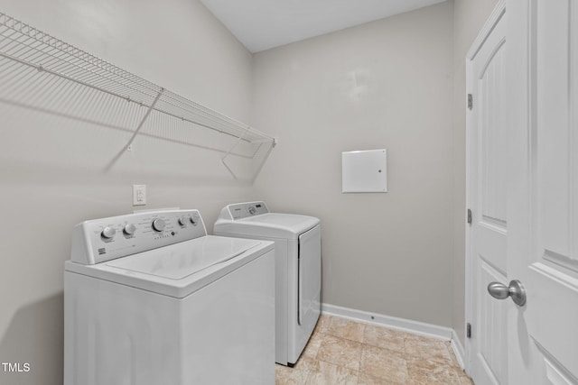 119 Yadkin St, Clayton, NC 27520 - washroom featuring washing machine and dryer and baseboards
