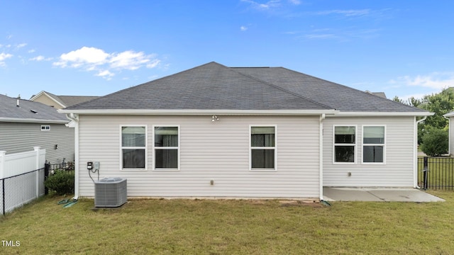 119 Yadkin St, Clayton, NC 27520 - back of property with a patio and a shingled roof
