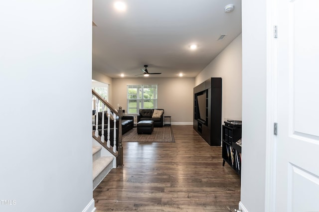 9 Moss Side Ter, Durham, NC 27703 - living area with stairs, ceiling fan, dark wood-style floors, and recessed lighting