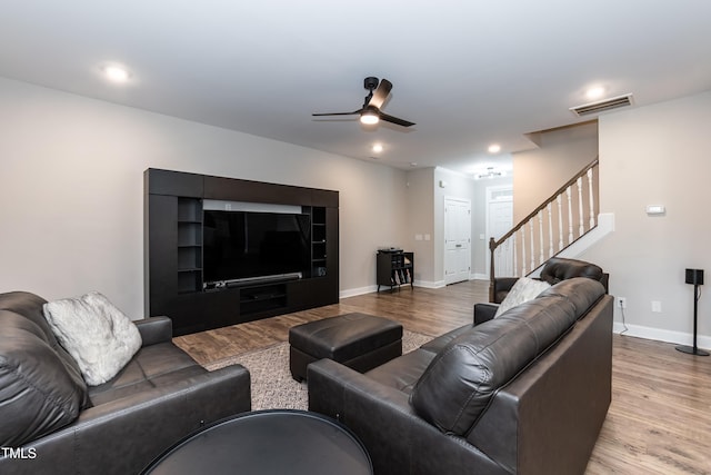 9 Moss Side Ter, Durham, NC 27703 - living room featuring stairway, wood finished floors, a ceiling fan, and recessed lighting