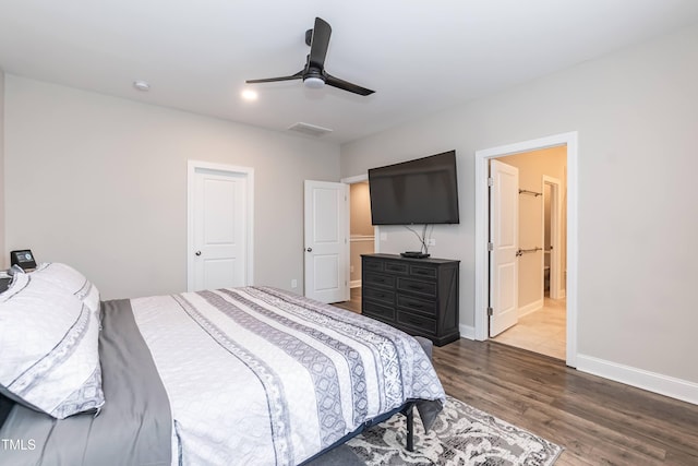 9 Moss Side Ter, Durham, NC 27703 - bedroom featuring dark wood-type flooring, a ceiling fan, and ensuite bathroom