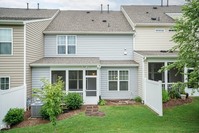 9 Moss Side Ter, Durham, NC 27703 - rear view of house featuring a sunroom and a shingled roof