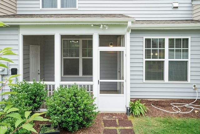 9 Moss Side Ter, Durham, NC 27703 - doorway to property featuring roof with shingles