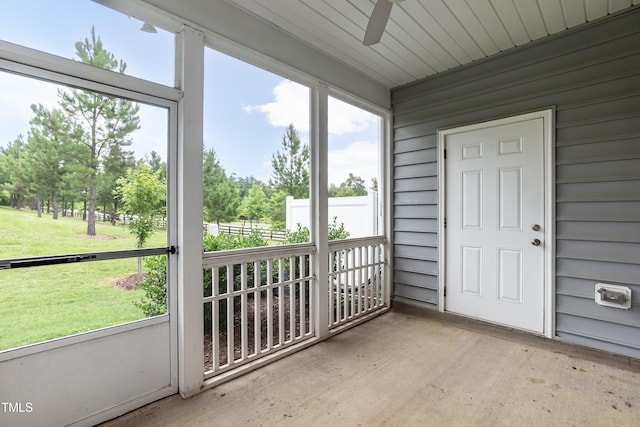 9 Moss Side Ter, Durham, NC 27703 - unfurnished sunroom featuring a ceiling fan and plenty of natural light