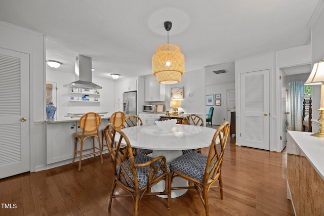926 Wimbleton Dr, Raleigh, NC 27609 - dining room featuring wood finished floors