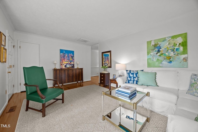 926 Wimbleton Dr, Raleigh, NC 27609 - living area with wood finished floors and crown molding