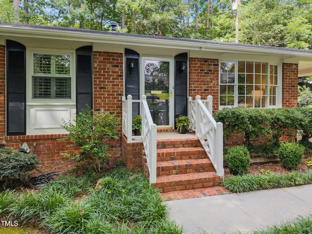 926 Wimbleton Dr, Raleigh, NC 27609 - doorway to property featuring brick siding