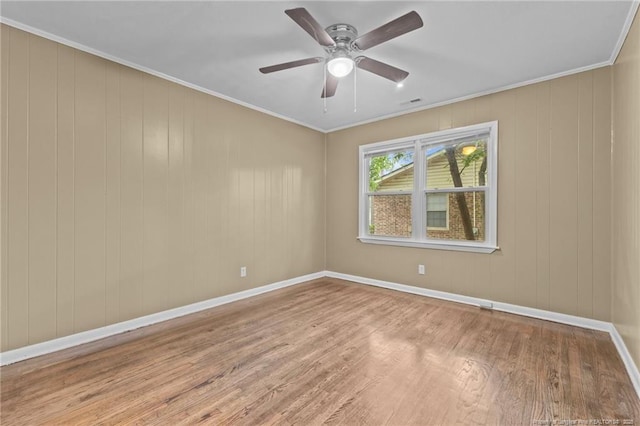 425 N Platte Rd, Fayetteville, NC 28303 - empty room featuring wood finished floors, ceiling fan, and ornamental molding
