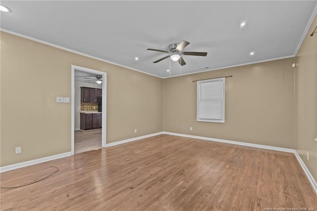 425 N Platte Rd, Fayetteville, NC 28303 - empty room with ceiling fan, wood finished floors, ornamental molding, and recessed lighting