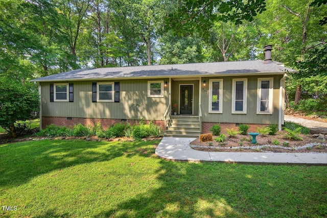 810 Royal Oaks Dr, Durham, NC 27712 - ranch-style house featuring crawl space, a front yard, and roof with shingles