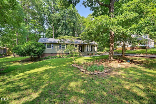 810 Royal Oaks Dr, Durham, NC 27712 - view of front facade with crawl space and a front yard