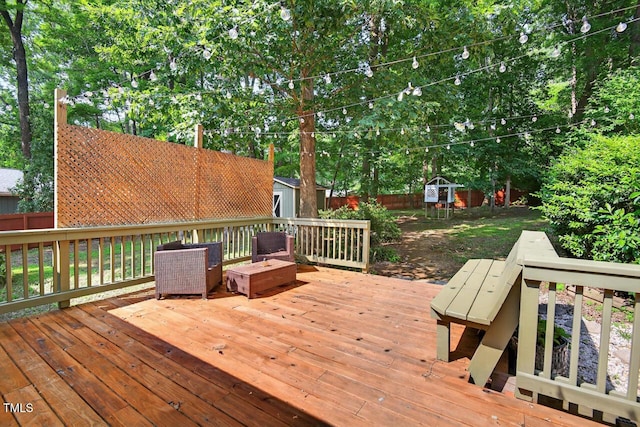 810 Royal Oaks Dr, Durham, NC 27712 - wooden terrace featuring a shed, a fenced backyard, and view of wooded area