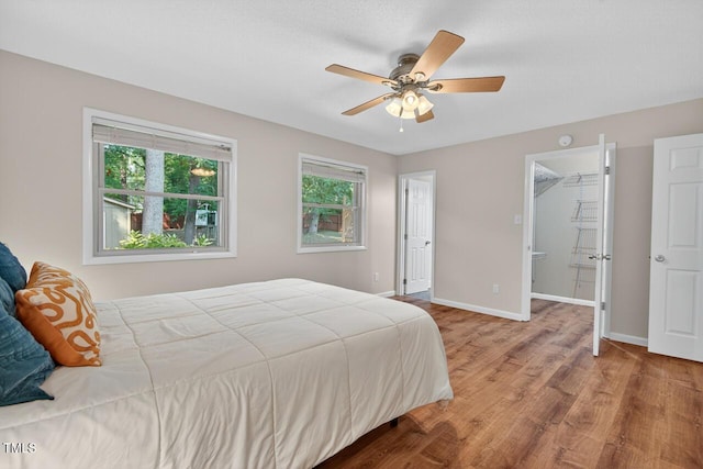 810 Royal Oaks Dr, Durham, NC 27712 - bedroom featuring wood finished floors and ceiling fan