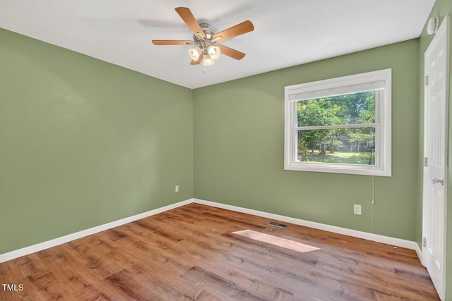 810 Royal Oaks Dr, Durham, NC 27712 - unfurnished room with wood finished floors, ceiling fan, and a smoke detector