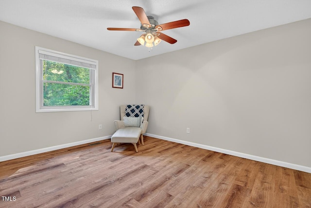 810 Royal Oaks Dr, Durham, NC 27712 - living area featuring wood finished floors and ceiling fan