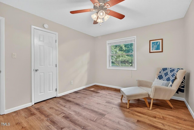 810 Royal Oaks Dr, Durham, NC 27712 - living area with light wood-style flooring and a ceiling fan