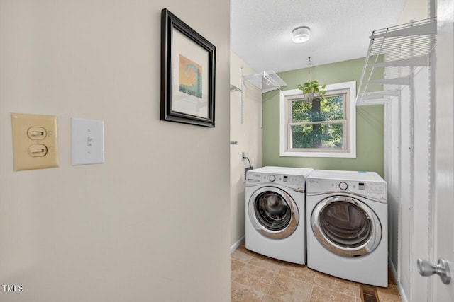 810 Royal Oaks Dr, Durham, NC 27712 - washroom featuring washing machine and clothes dryer and baseboards