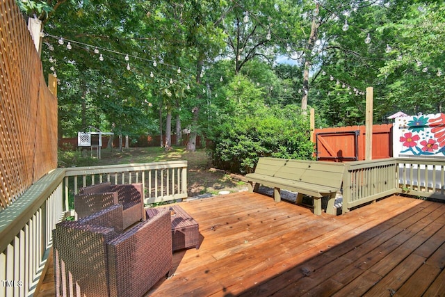810 Royal Oaks Dr, Durham, NC 27712 - wooden terrace with view of wooded area and a fenced backyard