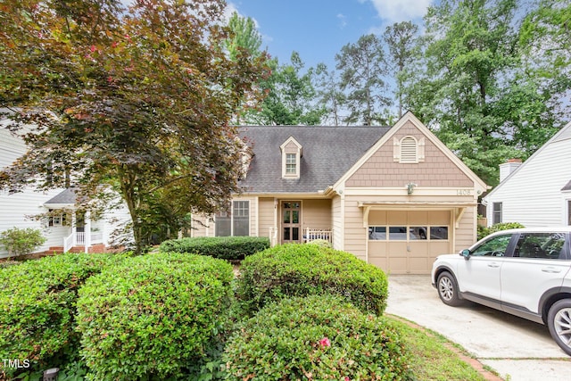 1408 Morningsdale Dr, Raleigh, NC 27609 - view of front of property with an attached garage, concrete driveway, and roof with shingles