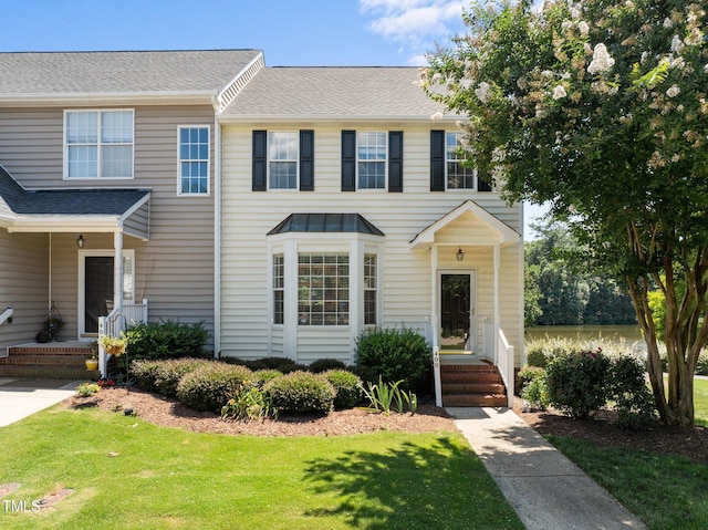 400 Nottinghill Walk, Apex, NC 27502 - view of property with a front yard and roof with shingles