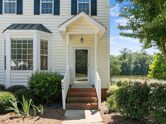 400 Nottinghill Walk, Apex, NC 27502 - doorway to property featuring a standing seam roof