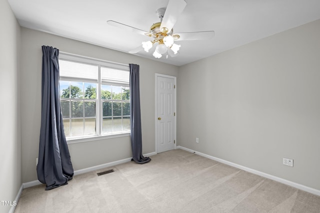 400 Nottinghill Walk, Apex, NC 27502 - carpeted empty room featuring baseboards and a ceiling fan
