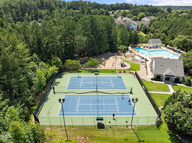 400 Nottinghill Walk, Apex, NC 27502 - bird's eye view of a pool area and a heavily wooded area