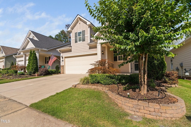 1019 Santiago St, Durham, NC 27703 - view of front of house with driveway, a garage, board and batten siding, and a front yard