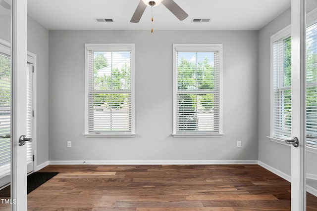 1019 Santiago St, Durham, NC 27703 - unfurnished room with healthy amount of natural light, wood finished floors, and a ceiling fan