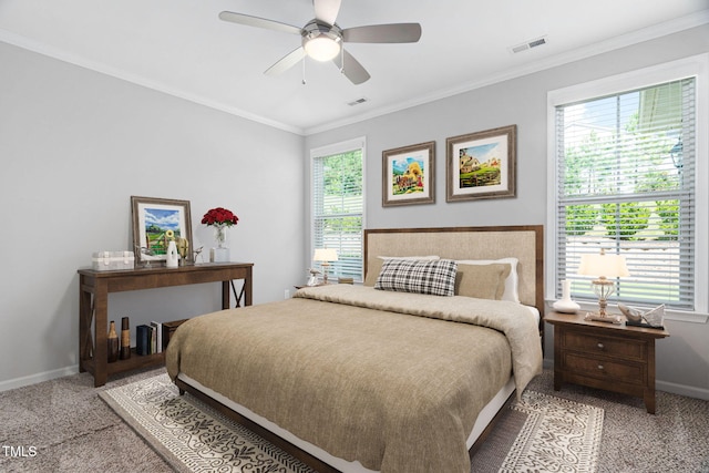 1019 Santiago St, Durham, NC 27703 - bedroom featuring multiple windows, carpet flooring, ornamental molding, and a ceiling fan
