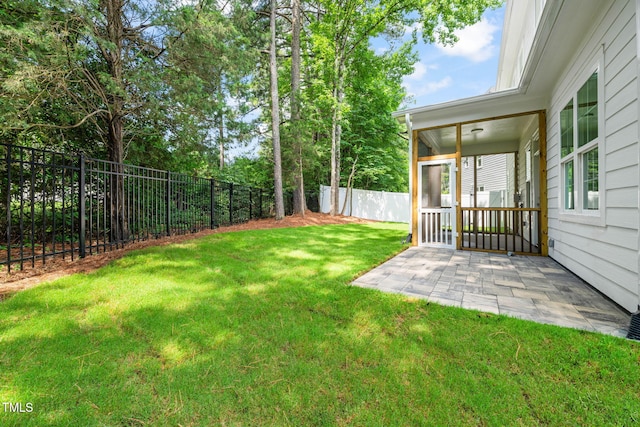 525 Kings Lake Way, Durham, NC 27703 - fenced backyard featuring a patio area