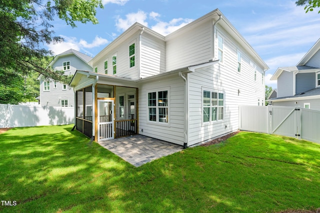 525 Kings Lake Way, Durham, NC 27703 - rear view of property featuring a gate, a patio, and a fenced backyard