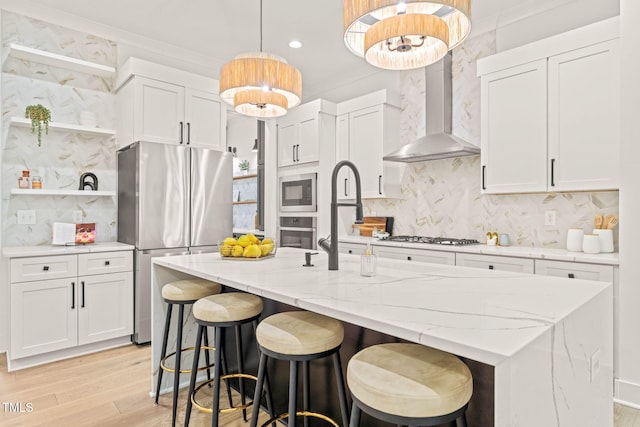 525 Kings Lake Way, Durham, NC 27703 - kitchen with stainless steel appliances, wall chimney range hood, light wood-style flooring, open shelves, and backsplash