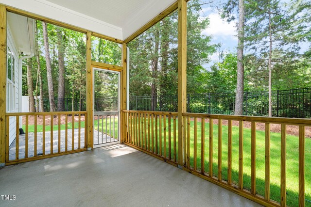 525 Kings Lake Way, Durham, NC 27703 - unfurnished sunroom with view of wooded area and healthy amount of natural light